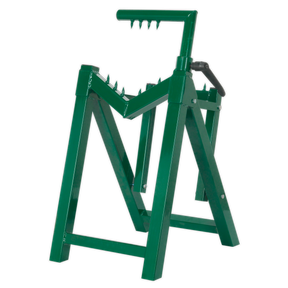 The Sealey Heavy-Duty Log Stand Ø230mm Capacity - LC300ST is a green metal saw horse that's easy to assemble and compatible with chainsaws. It securely holds logs for cutting, featuring serrated edges and sturdy legs for stability.