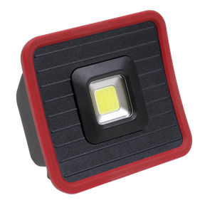 The Sealey Rechargeable Pocket Floodlight with Power Bank 10W COB LED - LED1000PB is a compact, lightweight work light featuring a red border and a central yellow LED panel, emitting 1000 lumens. It is equipped with a USB power bank for added convenience.