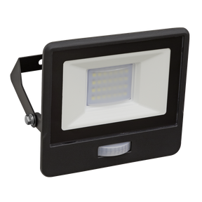 The Sealey Extra Slim Floodlight with PIR Sensor 20W SMD LED - LED112PIR is a black rectangular light with multiple SMD LEDs visible under the protective cover, complete with a mounting bracket and an IP65 rating for ultimate weather resistance.