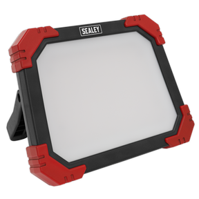 The Sealey Site Light 24W SMD LED 230V (LED24230) features a black and red casing, providing ultra-bright illumination from its large rectangular light panel and includes a foldable rear stand for convenience.