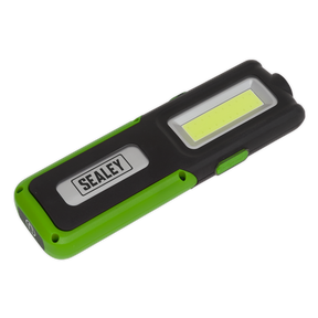 A Sealey Rechargeable Inspection Light, model LED318G, in black and green, featuring a rectangular shape, a side clip, and a super bright 5W COB LED light with an additional 3W SMD LED and power bank functionality—perfect for any task.