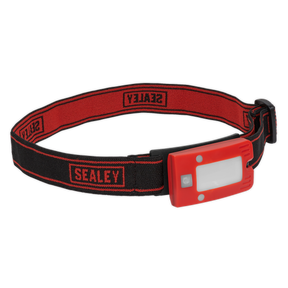 A Sealey Rechargeable Head Torch 2W COB LED Auto-Sensor in red, model LED360HTR, featuring an adjustable strap and a rechargeable LED light.