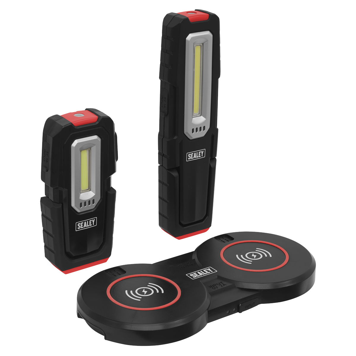 Two black Sealey Insp. Light 3W & 5W COB LED with red accents and a Double Wireless Charge Base (LEDWCBCOMBO4). The wireless rechargeable station features two circular pads with icons indicating charging capability and includes a dimming function for versatile lighting options.