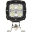 The Sparex LED Work Light (S.151835) features a square design with four individual LED bulbs mounted on a sturdy metal bracket. It boasts an IP6K9K rating for durability in harsh conditions and delivers 4000 lumens of raw light output. With a sleek black casing secured by silver screws and a clear lens, the light includes a DT Connector for easy installation and operates within a 10-30V range.