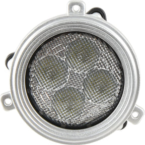 A close-up of the round metal component with a mesh center and three mounting brackets reveals a rugged design reminiscent of the Sparex LED Work Light, Interference Class 3, which features 4800 Lumens Raw and operates within a 10-30V range (Sparex Part No. S.152142).