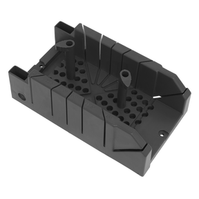 The Sealey Mini Mitre Box 310 x 170 x 110mm - MB02 is a black plastic general-purpose clamping mitre box with various slots and holes designed to guide saw cuts at precise angles, and features a non-slip edge for added stability.