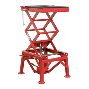 A red Hydraulic Motorcycle Lift Off-Road/Trials Bikes 135kg - MC135 by Sealey, featuring a black support platform and robust steel scissor construction, designed for elevating heavy objects.