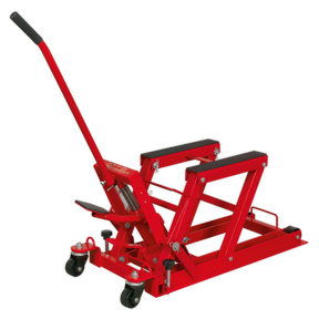 The Sealey Motorcycle & Quad Lift MC480, a red hydraulic lifting device with a handle and four wheels, features lifting arms and heavy steel construction to support motorcycles for maintenance, with a capacity of 680kg.