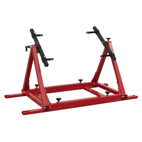 The Sealey Engine Rebuild Stand - Multi-Cylinder 100kg - MES03 is a red and black adjustable support stand designed for mounting and rotating multi-cylinder engines during maintenance or repair work.
