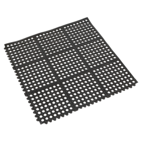 The Sealey Interlocking Anti-Fatigue Matting 920 x 920mm - MIC9292 is a black rubber mat designed with circular holes in a grid pattern. It features scalloped edges and offers flexibility and durability, providing excellent relief from fatigue.