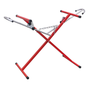 The Sealey Folding Bumper Stand - MK54 is a red, X-shaped metal keyboard stand with adjustable height and rubberized feet, featuring extendable arms to accommodate various keyboard instruments.