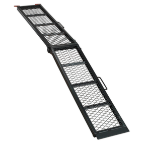 Experience the robustness of the Sealey Steel Mesh Folding Loading Ramp MR360, a folding black metal ramp with a diamond-patterned surface designed for effortless motorbike loading and unloading, supporting up to 360kg.