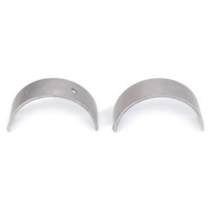 Two silver-colored metal half-circle AGCO bearings (part number V836655536), placed side by side on a white background, perfect for Vario S3 and Massey Ferguson Models.