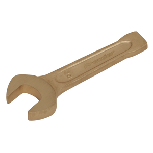 A professional-grade, bronze-colored Slogging Spanner Open-End 22mm from Sealey, made of Beryllium Copper and featuring the inscription "Premier" on the handle, ideal for environments requiring Non-Sparking Safety Tools. Product code: NS017.