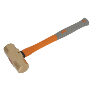 The Sealey Sledge Hammer 4.4lb - Non-Sparking - NS089 features an orange handle, a shock-absorbing rubber grip for enhanced comfort, and a brass head.