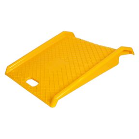 Introducing the Sealey Portable Access Ramp 450kg Capacity - PAR01, a durable yellow plastic ramp with a textured surface, designed for easy one-person transport and featuring a handle on the front edge for grip. Ideal for safely moving goods in snowy conditions, it’s built to last and can handle tough tasks effortlessly.