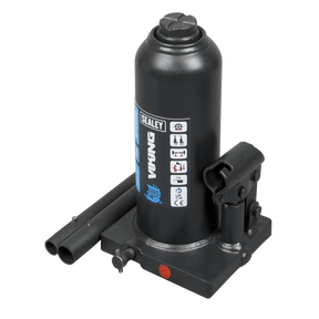 A black hydraulic bottle jack with a machine-welded frame and a 2-piece handle, labeled as the Sealey Bottle Jack 5 Tonne - PBJ5S.
