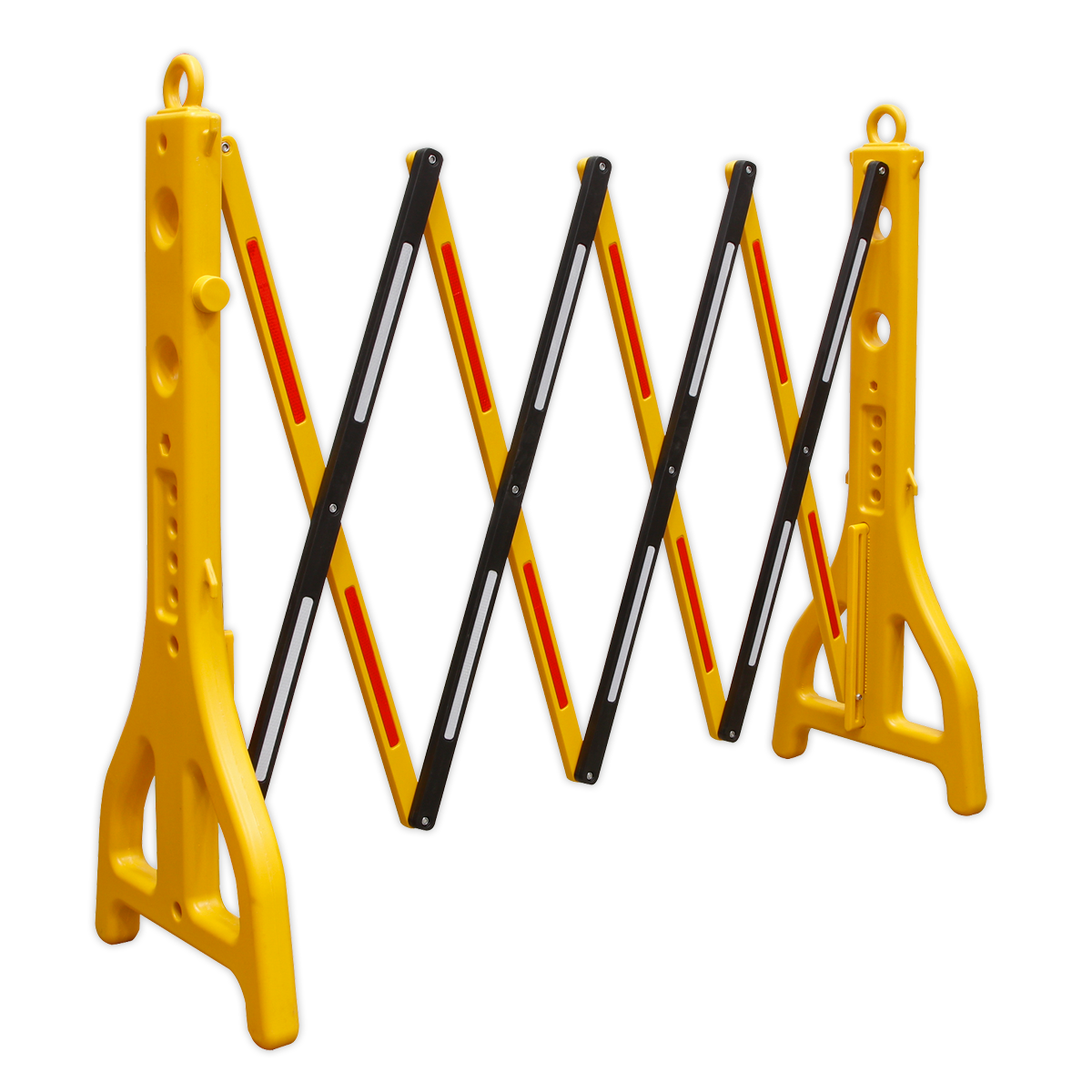 A Sealey Folding Barrier 2500mm Plastic - PFB2500 in yellow and black, featuring perforated legs for stability, a weighted base, and a diagonal crisscross pattern with reflective strips.