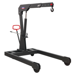 A black Premier Engine Crane 3 Tonne - Fixed (PFC301) by Sealey comes with wheels, a red handle, and a 4-position beam. This heavy-duty crane is equipped with a robust forged hook for reliable lifting tasks.