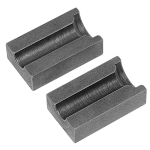 Two Sealey Clamp Blocks 3/8" for PFT07 (PFT07.04), each with a 3/8" clamp block design and identical rectangular metal forms, feature curved inner grooves and are positioned side by side.