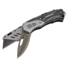 A folding pocket knife with two partially extended utility blades, featuring a stainless steel handle and the brand name "Sealey" engraved on it, known as the Pocket Knife Locking Twin-Blade - PK37.