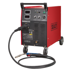 A red and black welding machine labeled "Professional MIG Welder 250A 415V 3ph with Binzel® Euro Torch - POWERMIG3525" by Sealey is on wheels and comes with a connected welding torch, featuring a heavy-duty electronic wire drive motor.