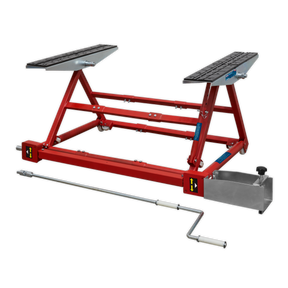 The Sealey Portable Pivot Car Lift 1500kg - PPL01 features adjustable width settings and a crank handle, designed for easy access to the underside while elevating motorcycles for maintenance.