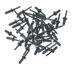 A scattered pile of Sealey Plastic Rivet Ø6.6 x 17.2mm Pack of 50 - PR001, dark in color.