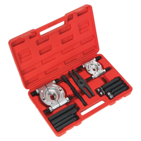 A Double Mechanical Bearing Separator/Puller Set 12pc (PS984) by Sealey comes in a red plastic case and includes Ø25-50mm separators, a 170mm thrust bolt, metal separators, a hexagonal puller, screws, and rods.