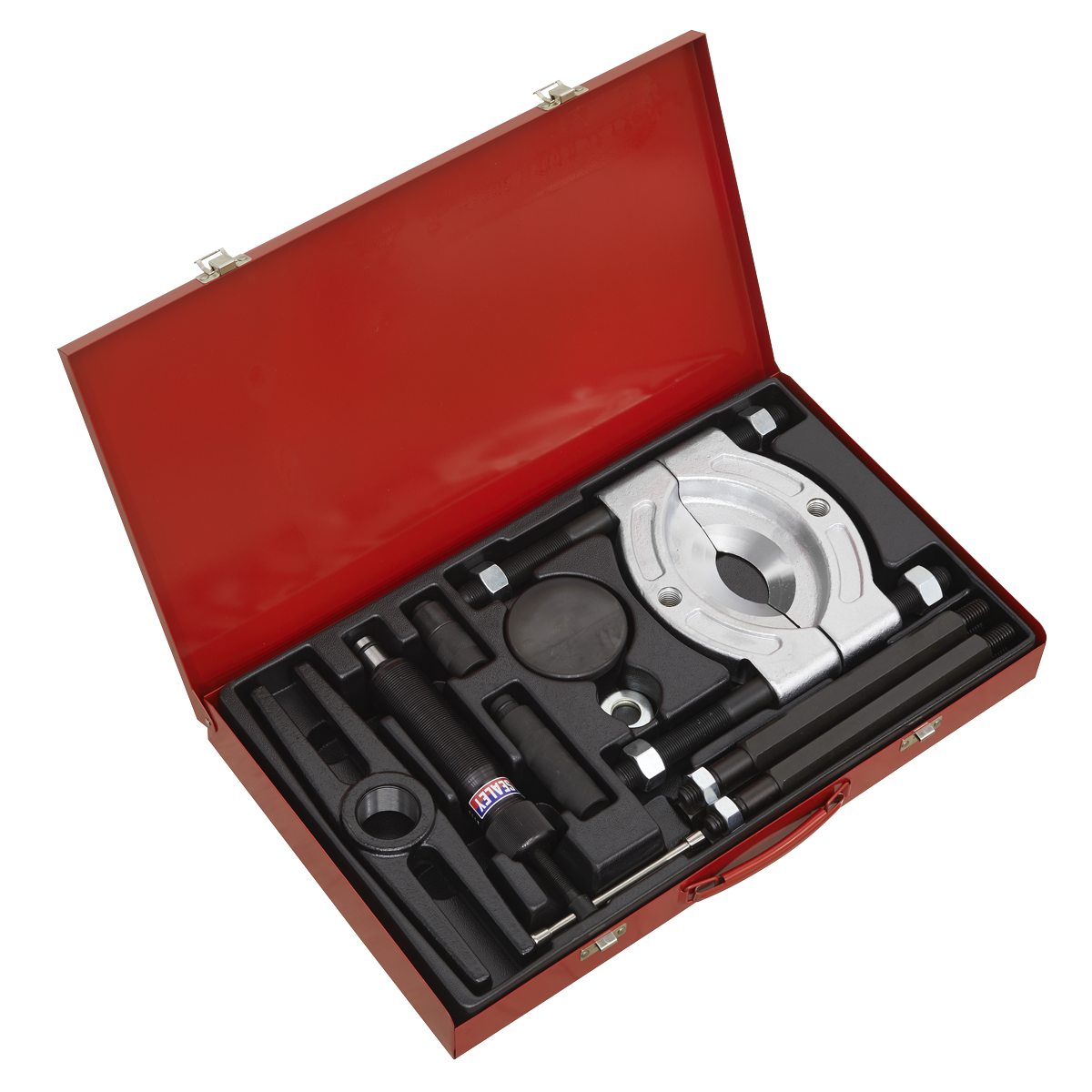 The Sealey PS985 Hydraulic Bearing Separator/Puller Set 10pc comes in a red toolbox and includes an array of mechanical tools such as clamps, bolts, and a hydraulic ram. These tools are neatly organized in foam cutouts.