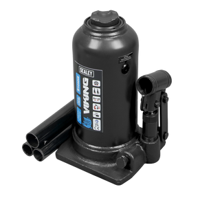 A black hydraulic bottle jack labeled "Viking Telescopic Bottle Jack 5 Tonne - PTBJ5S" from Sealey features high-quality ENP rams and comes with a 3-piece handle detached and placed beside it.