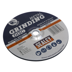 Close-up of a Sealey grinding disc, model number PTC/230G. This aluminium oxide disc is 230mm in diameter, 6mm thick, with a bore size of 22mm and a maximum RPM of 6650. Safety and usage details are visible on the label.