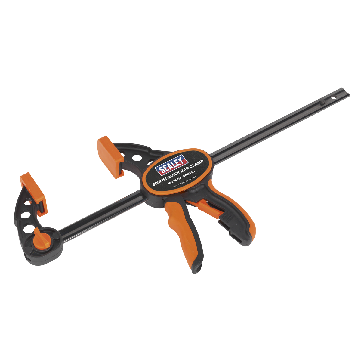 The "Sealey Quick Bar Clamp 300mm - QBC300" is a heavy-duty clamp with a carbon steel bar and a textured TPR grip handle in orange and black.