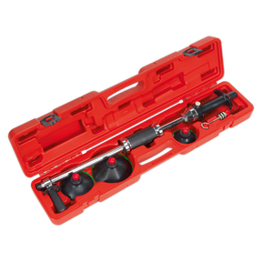 Sealey Air Suction Dent Puller - Plunger Type - RE012, a red plastic case containing a variety of attachments for effective panel reshaping.