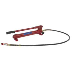 The Sealey Pump & Hose Assembly 10 Tonne - RE97.10-01 features a red hydraulic hand pump with a long black hose and attached metal fittings, ideal for use with Sealey Body Repair Kits.