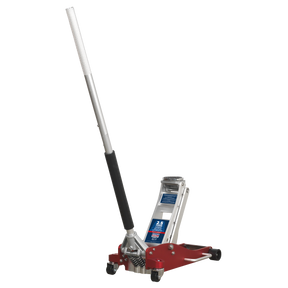 The Sealey Trolley Jack 2.5 Tonne Low Profile Aluminium Rocket Lift - RJA2500 is a lightweight, red and silver hydraulic floor jack that includes a long handle with a padded area for comfort, and features wheels for mobility. This jack also boasts a low profile lifting range and displays its weight capacity prominently.