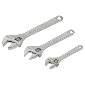 Three Sealey Adjustable Wrench Set 3pc (150, 200 & 250mm) - S0448, crafted from hardened steel and featuring a chrome-plated finish, are aligned in a row on a white background.