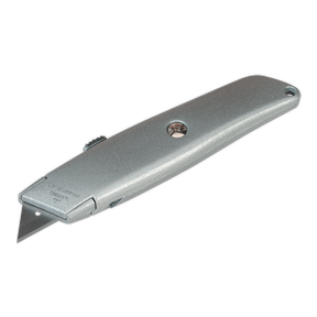 The Sealey Retractable Utility Knife - S0529 features a silver die-cast handle with a central screw for easy blade replacement, along with a retractable, reversible blade and a convenient thumb slider mechanism.