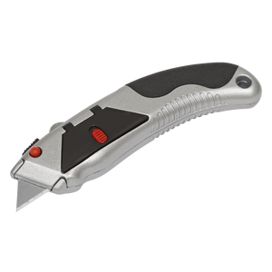 The Sealey Retractable Utility Knife Auto-Load - S0555 features a sleek silver design with a black grip and a red slider button, equipped with an auto-loading mechanism for swift blade changes.