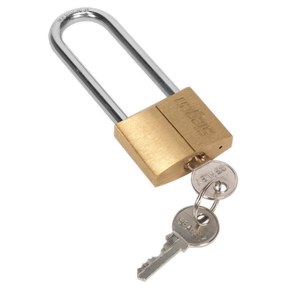 A brass body padlock, identified as the Brass Body Padlock with Brass Cylinder Long Shackle 40mm - S0989 from the Sealey brand, is shown with two inserted keys.