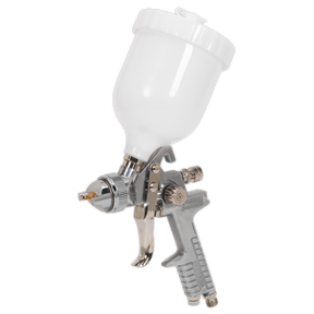 The Spray Gun Gravity Feed - 1.8mm Set-Up (S642G) by Sealey is a silver and white spray gun with an attached paint reservoir, designed with a precision air cap for optimal spray pattern.