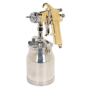The Sealey Spray Gun Professional Suction Feed - 1.8mm Set-Up (S701) in silver and gold, complete with an attached paint canister, is perfect for applying water-based paints or other liquids.