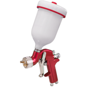 The Sealey Gravity Feed Spray Gun 1.4mm Set-Up - S714G is a red and silver tool featuring an adjustable spray width and a white container on top, ideal for automotive refinishing and spraying paint onto surfaces.