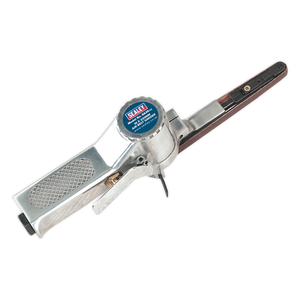 Image of a silver Air Belt Sander 10 x 330mm - SA35 with a blue "Sealey" logo on the side. The tool features a narrow, elongated sanding belt, a textured grip handle, and durable aluminium housing. It also boasts an advanced belt tracking control system for precise sanding.