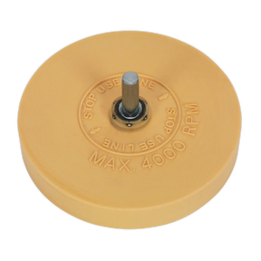 The Sealey Stripe Removing Pad Ø88 x 15mm, 6mm Mandrel - SA95/PXM is a round yellow rubber wheel featuring a metal spindle in the center, specifically designed for removing pinstripes. Marked with "MAX. 4000 RPM" and instructions to cease use if the line is crossed, it fits securely into a drill chuck for precise application.
