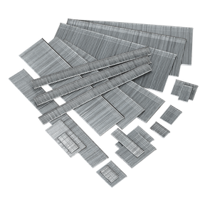 A collection of 25mm 18SWG nails from Sealey, packed in quantities of 5000 (product code: SAAN1825), spread out on a white surface.