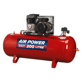 A robust air compressor from Sealey, featuring a striking red design and the model name "Air Compressor 200L Belt Drive 3hp with Cast Cylinders - SAC1203B," has a 200-liter capacity. Equipped with a black, powerful 3hp motor and various top-mounted control components, it delivers a maximum pressure of 145psi.