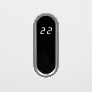 A modern vertical oval wall-mounted thermostat or control panel with a black face, silver metallic trim, and white LED display showing the number 22, set against a plain light gray background.