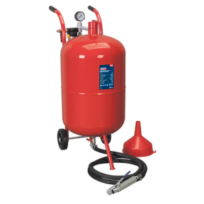 The Sealey Shot Blaster with Water Trap & Wheels 75L - SB998 is a red portable air compressor equipped with a pressure gauge, hose, and nozzle attachment. It features durable ceramic nozzles for grit blasting and comes on wheels with a red funnel beside it.