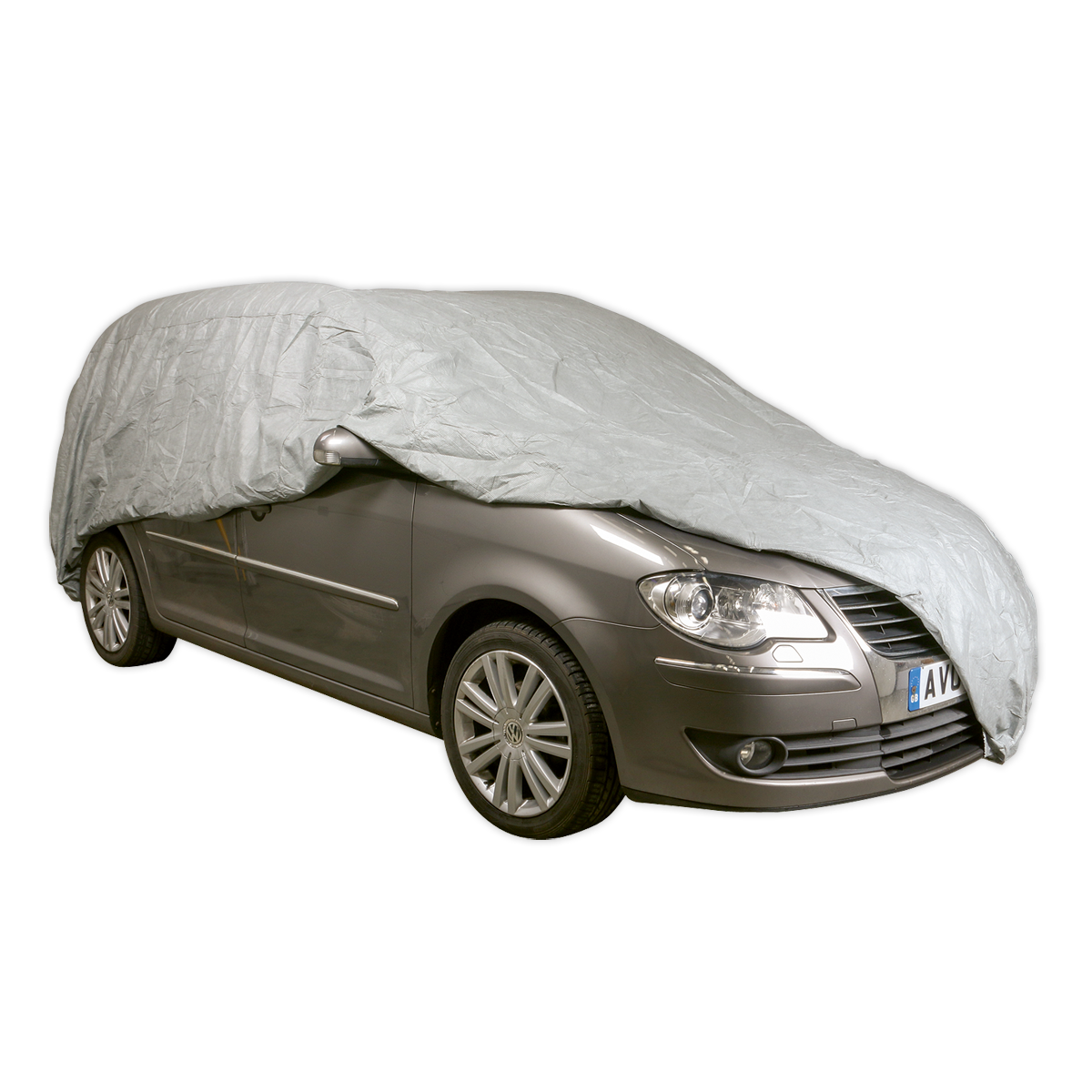 A grey car is partially covered by the waterproof, silver "All Seasons Car Cover 3-Layer - XX-Large (SCCXXL)" from Sealey, which shields the top and part of the front and rear of the vehicle.